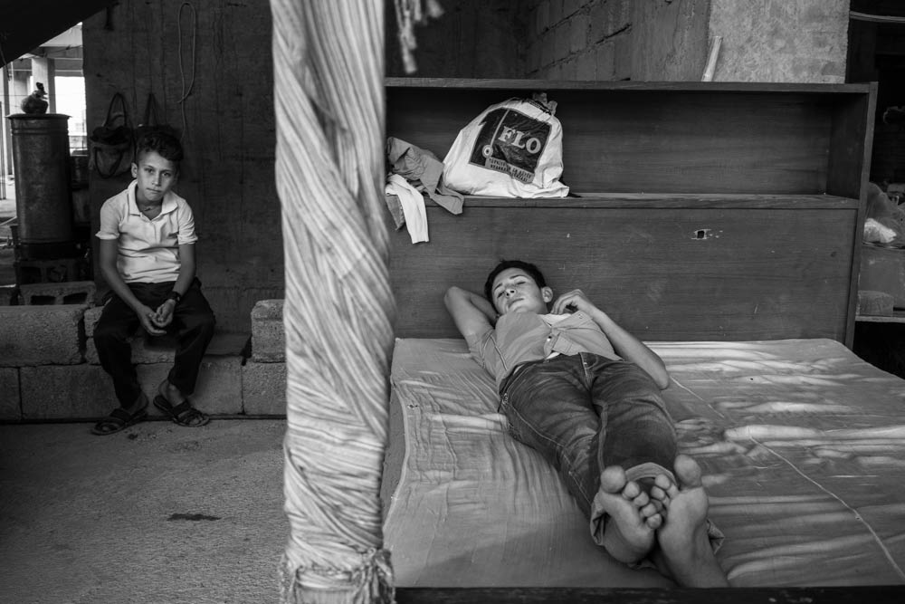  تصوير الكساندر افونسو - نازحون ايزديون لا يملكون شيئا لكنهم يهبون كل شيء 